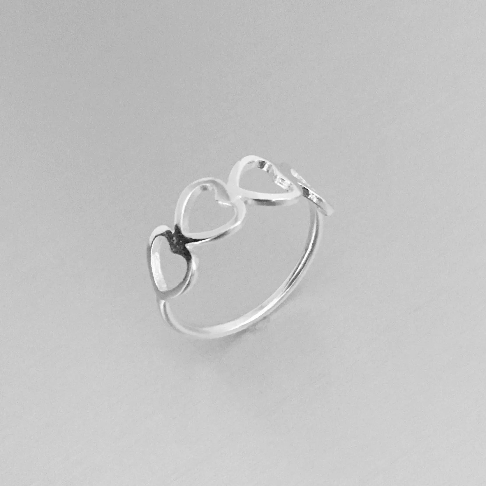 Sterling Silver Sideway Four Heart Ring