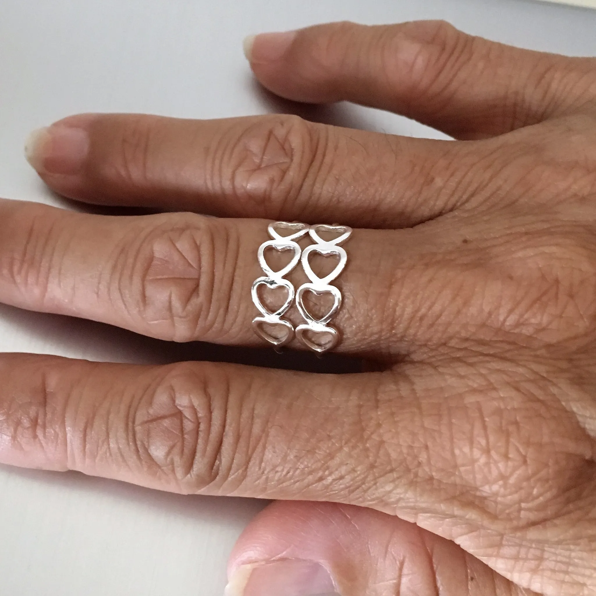 Sterling Silver Sideway Four Heart Ring