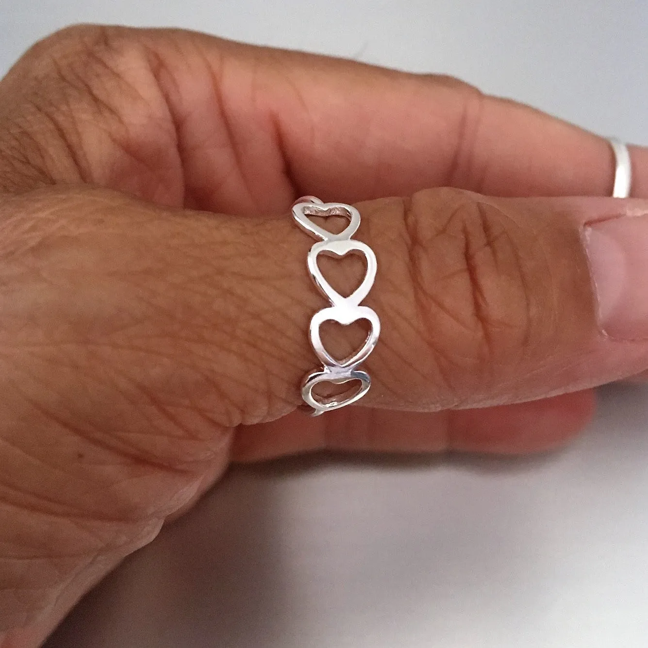 Sterling Silver Sideway Four Heart Ring